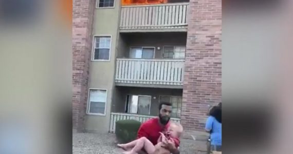 Two men are heroes today, one for catching a baby who was thrown off a balcony of a burning apartment and the other for going inside the same apartment and rescuing a child who was trapped inside.