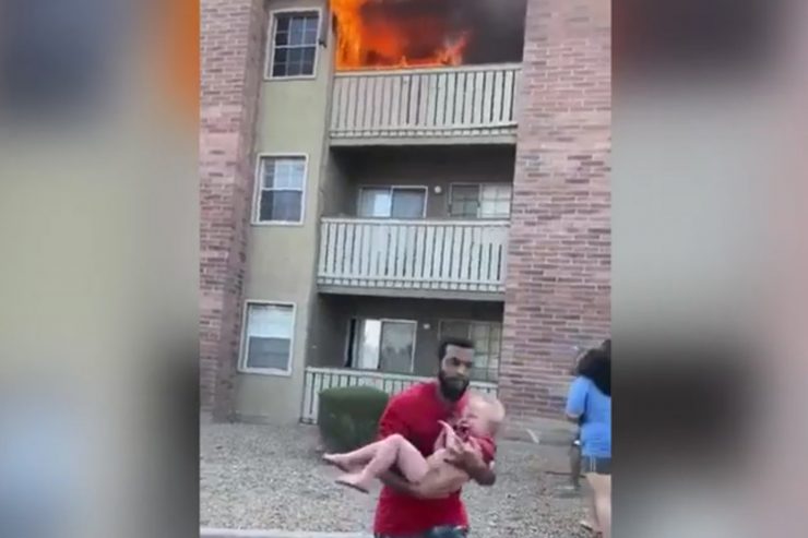 Two men are heroes today, one for catching a baby who was thrown off a balcony of a burning apartment and the other for going inside the same apartment and rescuing a child who was trapped inside.