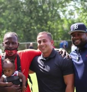 Officer reunites with three men who saved him during a protest in Louisville.