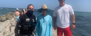 Teen notices man in ocean struggling in current, saves his life