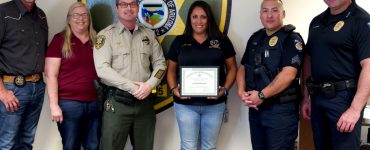 A Pinal County Sheriff's Office dispatcher saved the life of a Superior Police sergeant's life after he was stabbed by a suspect during a foot pursuit.