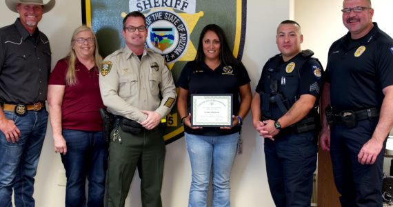 A Pinal County Sheriff's Office dispatcher saved the life of a Superior Police sergeant's life after he was stabbed by a suspect during a foot pursuit.